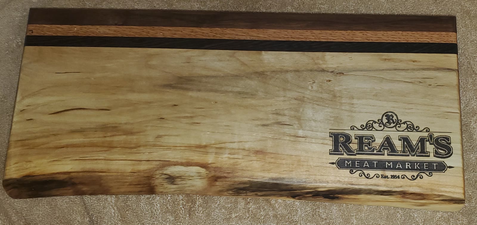 One-of-a-kind live-edge board by Board Grunt